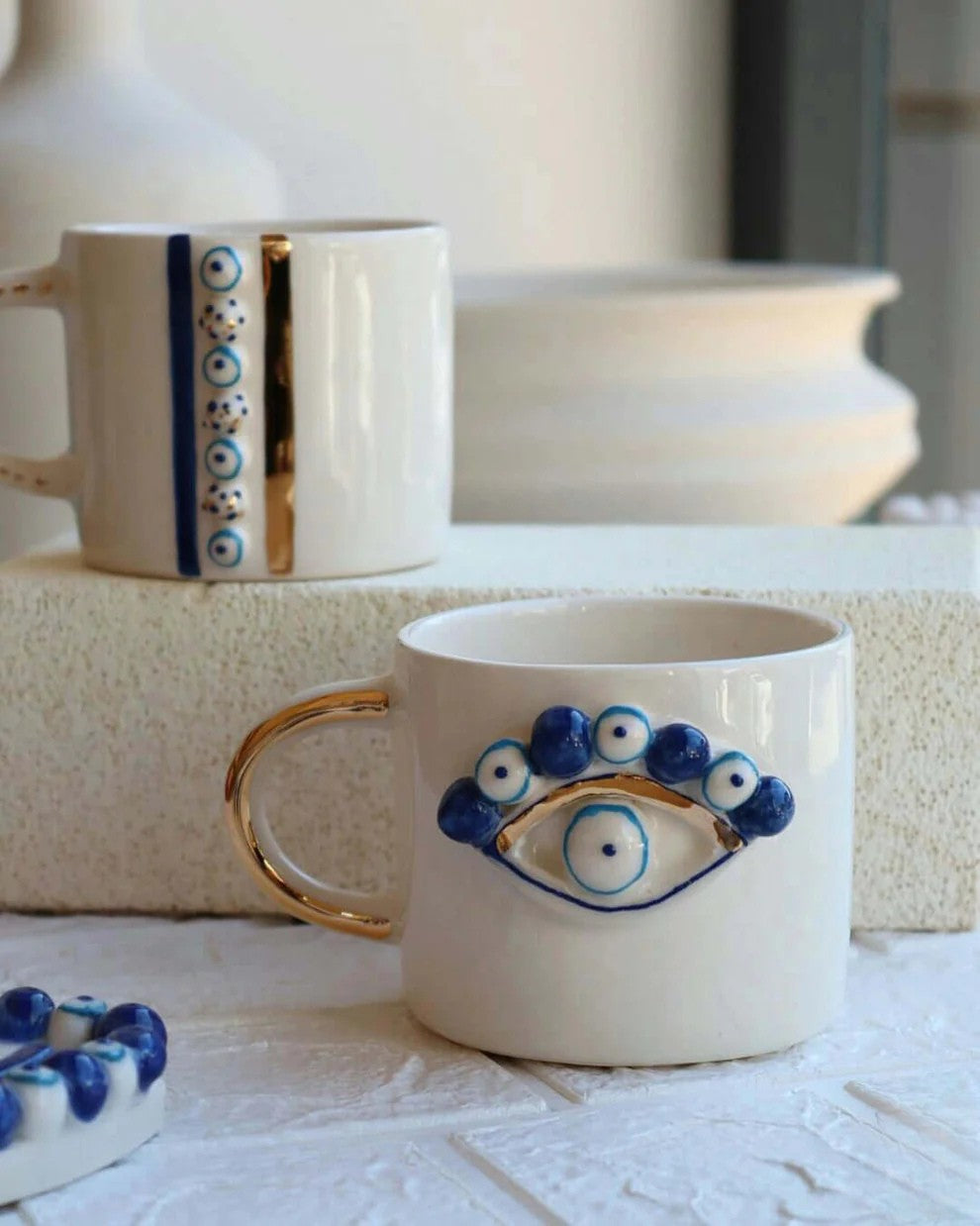 Handmade Evil Eye Ceramic Mug – Artisan Pottery with Gold Handle